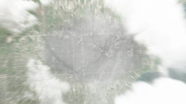 Earth zoom in from space to Clinton Township, Michigan, USA. Followed by zoom out through clouds and atmosphere into space. Satellite view. Travel intro. Images from NASA