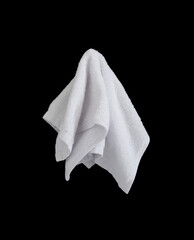 Fototapeta premium white face towel isolated on black