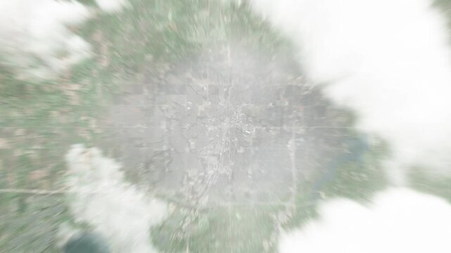 Earth zoom in from space to Edmond, Oklahoma, USA. Followed by zoom out through clouds and atmosphere into space. Satellite view. Travel intro. Images from NASA