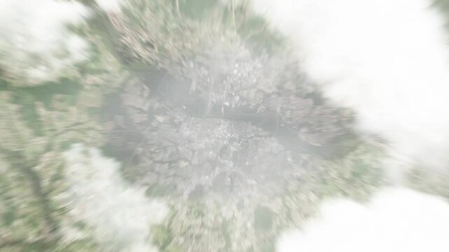 Earth zoom in from space to Greenville, North Carolina, USA. Followed by zoom out through clouds and atmosphere into space. Satellite view. Travel intro. Images from NASA