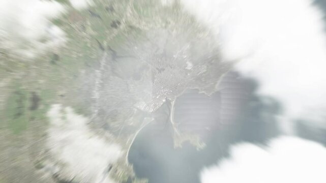 Earth zoom in from space to Lynn, Massachusetts, USA. Followed by zoom out through clouds and atmosphere into space. Satellite view. Travel intro. Images from NASA