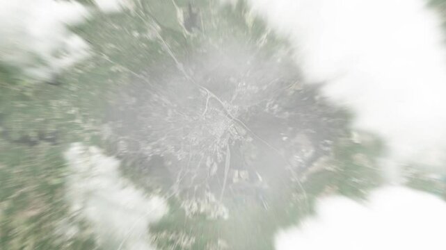 Earth zoom in from space to Macon, Georgia, USA. Followed by zoom out through clouds and atmosphere into space. Satellite view. Travel intro. Images from NASA