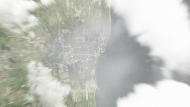 Earth zoom in from space to Waukegan, Illinois, USA. Followed by zoom out through clouds and atmosphere into space. Satellite view. Travel intro. Images from NASA