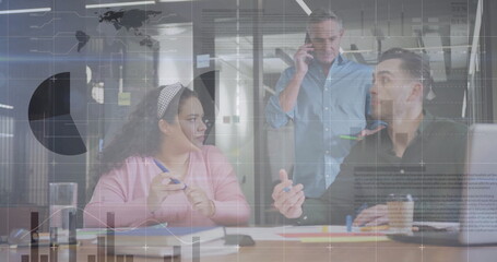 Image of financial data processing over diverse business people in office