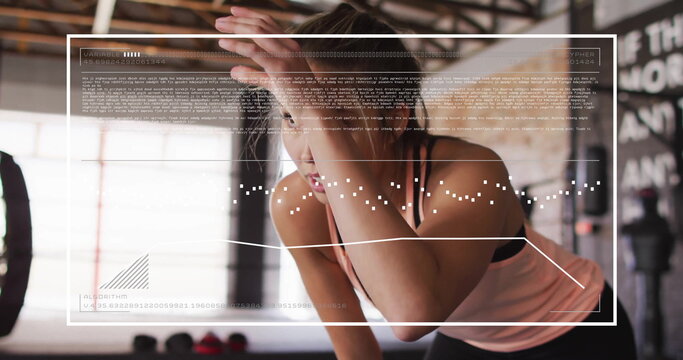 Image of digital data processing over biracial woman exercising in gym - Powered by Adobe