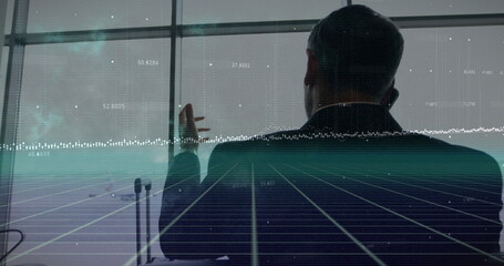 Image of data stream processing over caucasian businessman talking on smartphone at airport