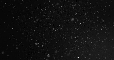 Image of pulsating spots of light on black background