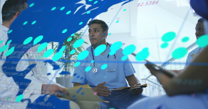 Image of data processing and world map over diverse doctors talking