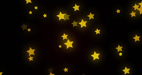 Naklejka premium Yellow stars image over dark background
