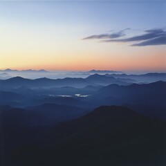 Serene Mountain Landscape at Dawn with Soft Colorful Sky