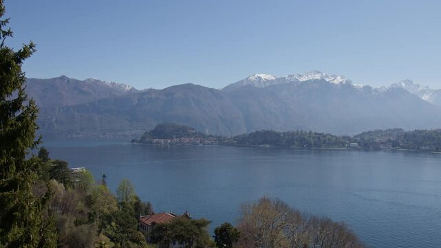 Calm Scene Of Lake Como Overlooking Bellagio Village In Italy. Wide Shot