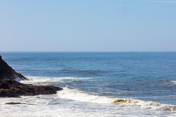 waves crashing on rocks