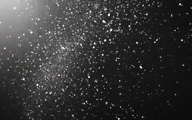 Abstract monochrome halftone vector texture with dispersed dotsinitWith a raw slatelike appearance