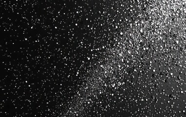 Obraz premium Abstract monochrome halftone vector texture with dispersed dotsinitWith a raw slatelike appearance