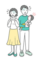 急な発熱をした子供を抱いて焦る若い父親と母親