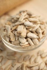 Healthy sunflower seeds in a glass bowl