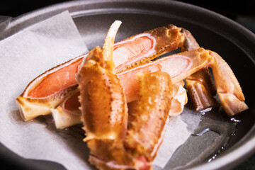 Close-up of Cooked Snow Crab Legs on a Plate