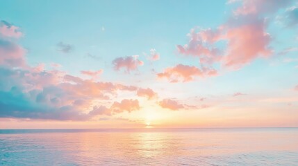Fototapeta premium Serene Sunrise Over Calm Ocean with Soft Clouds and Pastel Colors