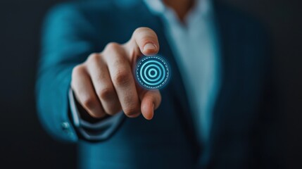 A businessman gestures towards a digital target symbol, representing innovation and focus in modern corporate strategies.