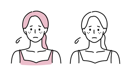 肌荒れを気にする女性