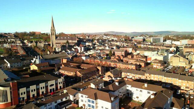 Forward travelling aerial of St. Eugene's Church in The Creggan area of Derry-Londonderry, Northern Ireland. Filmed in 4K, 60fps and in Rec709 color.