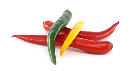 Colorful chili peppers creating a vibrant arrangement on white background