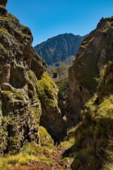Russia, Elbrus region. The differences of the Kyzylkol mountain river with picturesque valleys and waterfalls at the foot of the highest mountain in the Caucasus - Elbrus (5642 m).