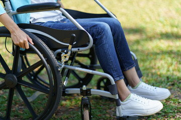 Obraz premium Depressed sad asian woman in wheelchair&nbsp;lonely disabled adult