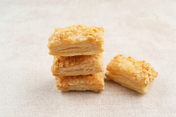 Crunchy pastry cookies with almond sprinkles 
