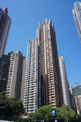 Fototapeta premium Stunning modern skyscrapers reaching toward a bright blue sky