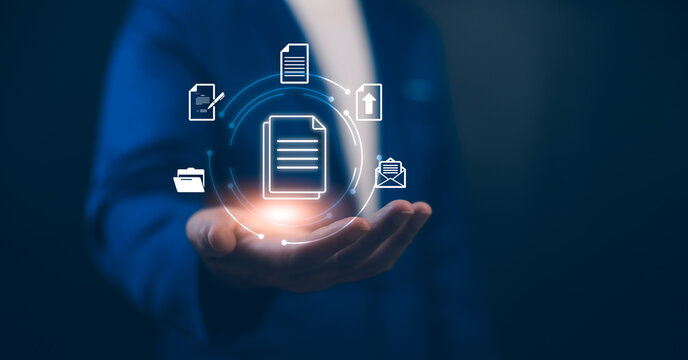 Businessman touching with icon document management, data sharing and secure storage. Concept of digital online document organization and efficient information in modern business. File storage system.