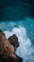 Fototapeta premium Dramatic Overhead Coastal Cliffs Ocean Waves Crashing on Rocks