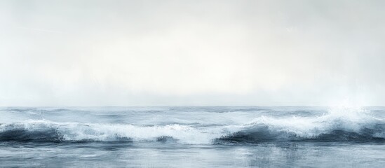Dramatic ocean waves crashing on shore under a moody sky.