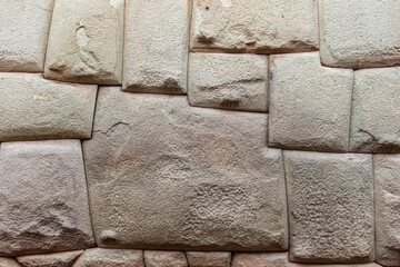 Twelve Angled Stone. Inca archaeological artifact in Cusco. Peru travel destination.