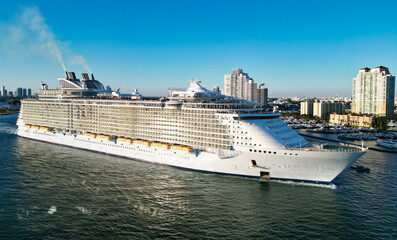 Ship leaving Miami beach port. Miami tour. Cruise ship voyage. Aerial view of cruise in summer...