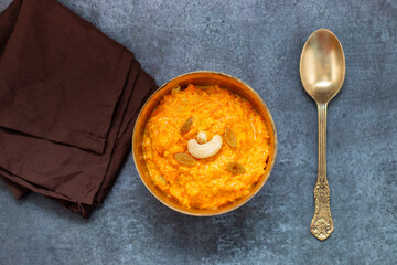 Gajar ka halwa is a rich Indian dessert made with grated carrots, milk, sugar, ghee, and nuts, slow-cooked to perfection.