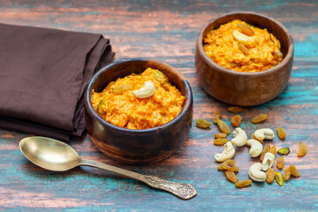 Gajar ka halwa is a rich Indian dessert made with grated carrots, milk, sugar, ghee, and nuts, slow-cooked to perfection.