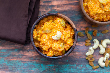 Gajar ka halwa is a rich Indian dessert made with grated carrots, milk, sugar, ghee, and nuts, slow-cooked to perfection.