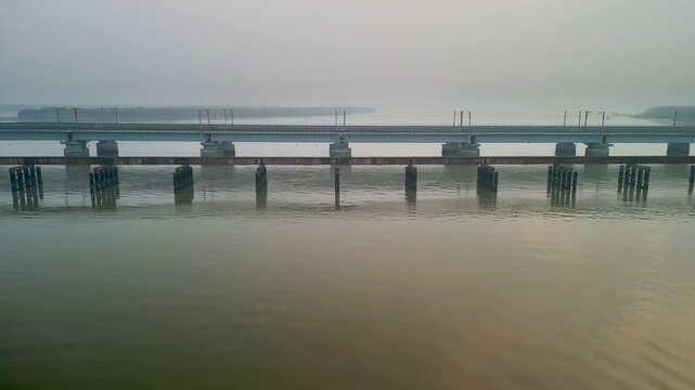 bhayandar to naigaon vasai creek railway bridge side empty drone shot .