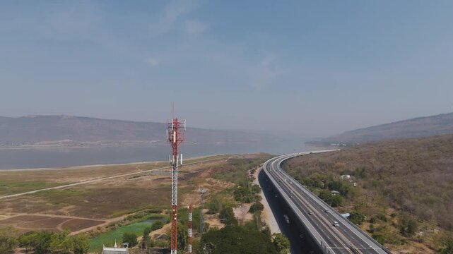 Drone footage the telecomunication tower near the motorway