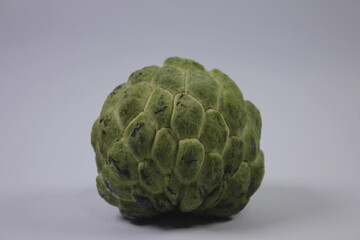 Isolated photo of Srikaya fruit. It has a sweet taste and there are lots of seeds
