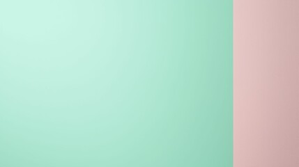 Fototapeta premium A minimalist image featuring a smooth gradient of mint green and pale pink colors, evoking a calm and modern aesthetic.