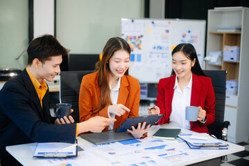 Young business creative team are brainstorming planning discussing while sitting in creative business discussing work