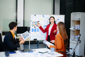 Young business creative team are brainstorming planning discussing while sitting in creative business discussing work