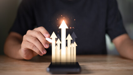 Businessman showing business growth and success graph ,concept of progress in development, financial efficiency and investment with business strategy for goals and opportunities in the industry future