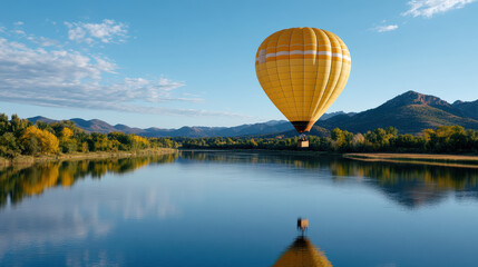 Fototapeta premium vibrant hot air balloon floats over tranquil lake surrounded by mountains