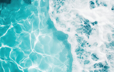 Obraz premium Crystal clear swimming pool water with gentle waves and foam creates serene atmosphere. vibrant turquoise color and light reflections enhance tranquil scene