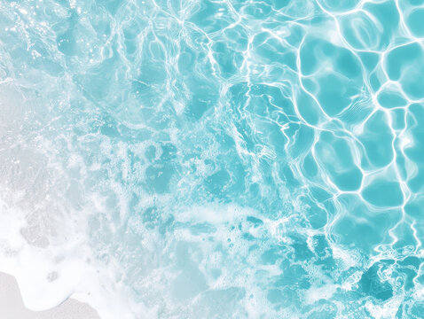 Crystal clear turquoise water with gentle waves and foam, creating serene and refreshing atmosphere. Perfect for relaxation and summer vibes