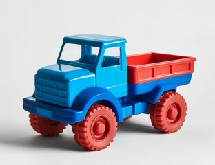 Blue and red plastic toy dump truck on white background.