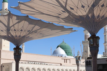 The famous Green Dome and minarets of the Holy Prophet's Mosque or Masjid Nabawi in Medina, Saudi...
